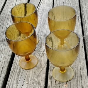 Bartlett Collins amber thumbprint goblets are expertly crafted from high-quality